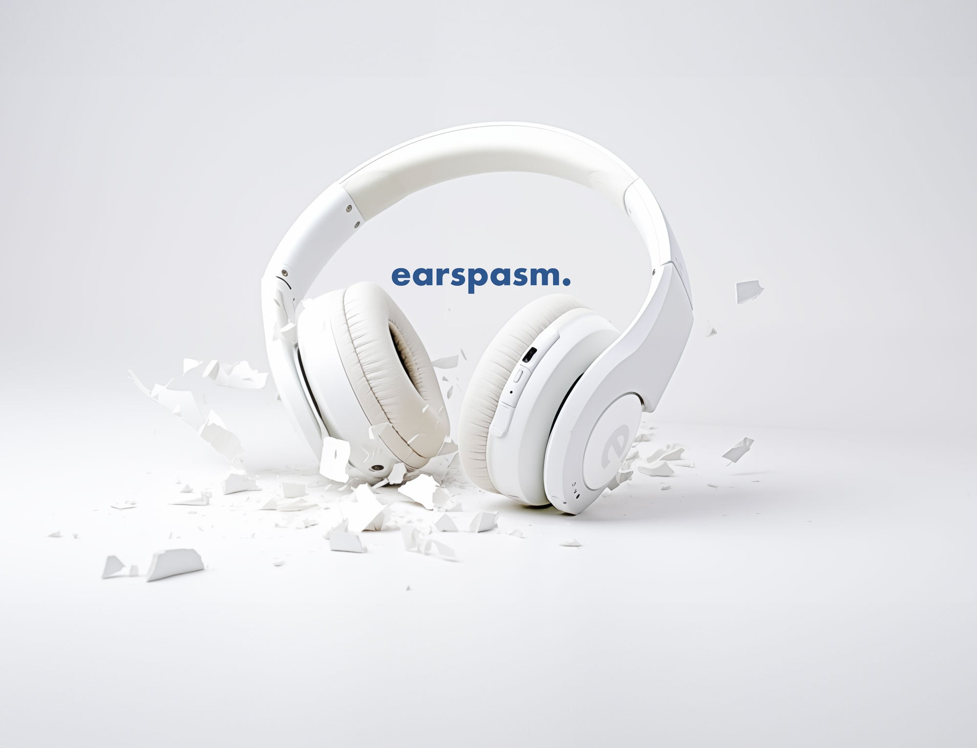Broken white headphones in a white room with the word "earspasm" written in the center